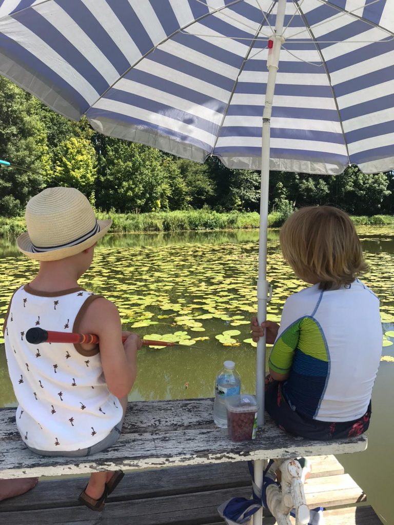 Fishing competition with children on the pond, the Kids Club of the 5 star campsite of the Chanteloup castle in the Sarthe near Le Mans